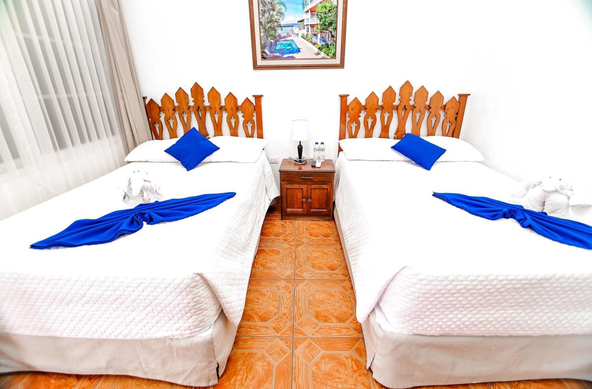 Hotel Villa Del Lago Flores Exterior photo